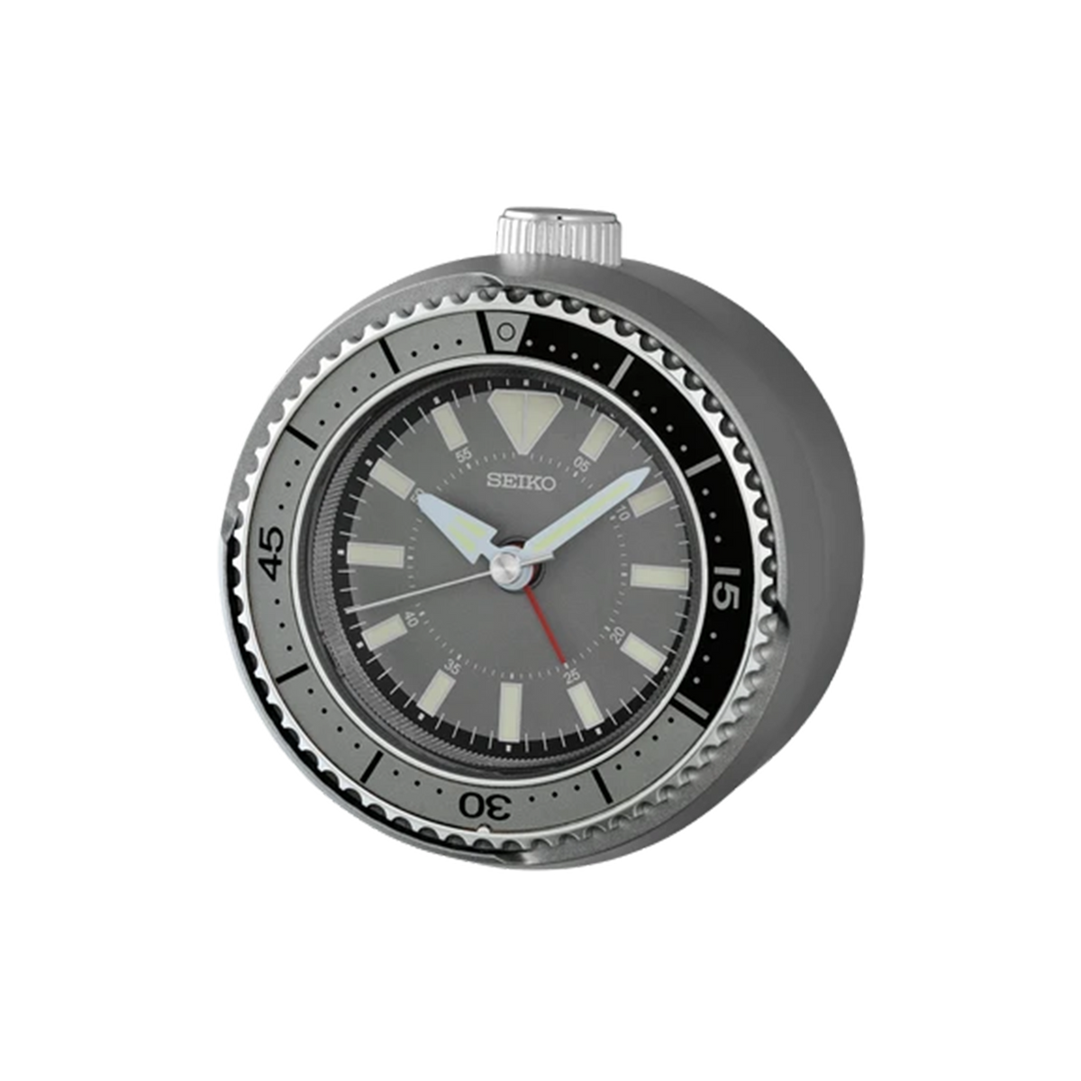 SEIKO QHE207NLH rotating bezel alarm clock with silver-tone metallic case, dark gray diver-style dial, LumiBrite markers, and watch-inspired design.