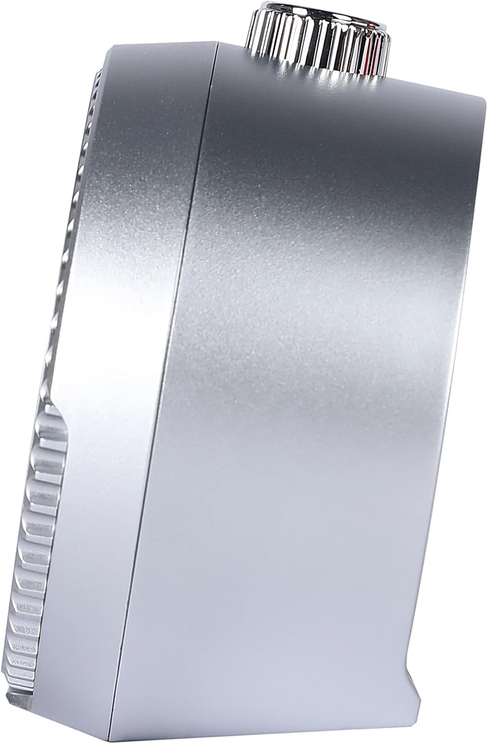 Side view of SEIKO QHE207KLH rotating bezel alarm clock showing its compact dark metallic case and angled desk clock profile.