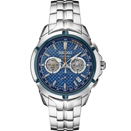 A SEIKO Coutura quartz chronograph watch with a blue carbon-fiber patterned dial, stainless steel bracelet, and a silver case.
