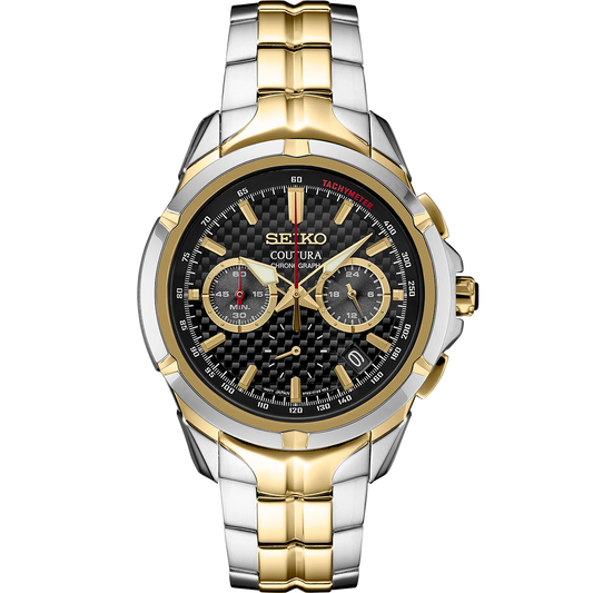 A SEIKO COUTURA SSB434 watch with a black dial, gold accents, and a stainless steel bracelet.