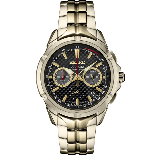 A SEIKO COUTURA SSB438 watch with a stainless steel bracelet and a light gold finish, featuring a black dial with gold accents and a date calendar.