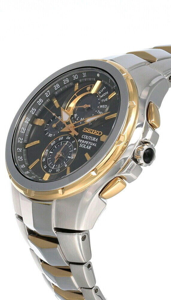 Seiko watch with silver and gold band on white background
