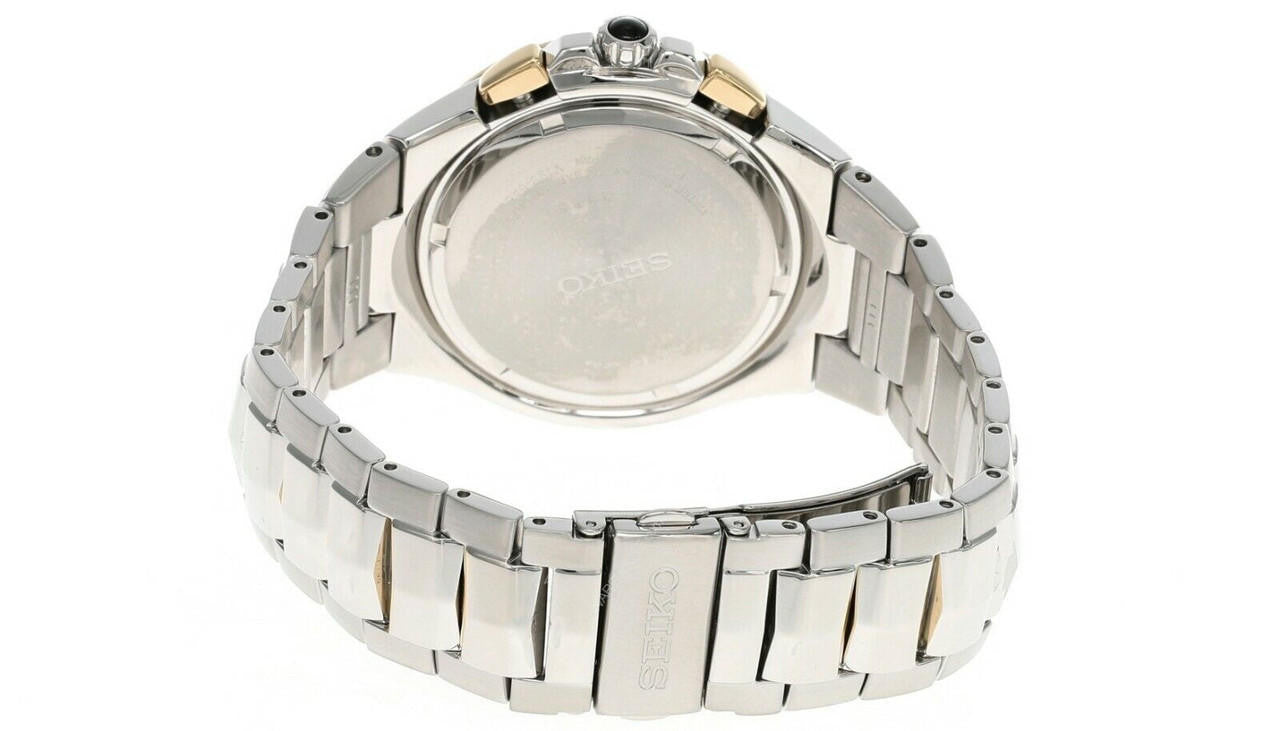 Silver watch with a white face on a white background