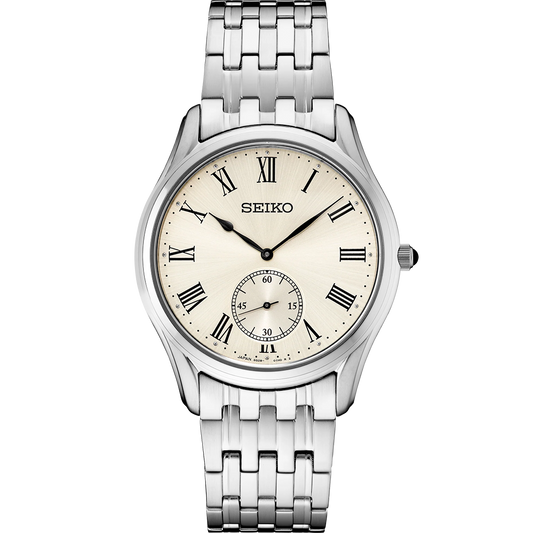 Seiko Essentials Collection SRK047 quartz watch with antique ivory Roman numeral dial, seconds subdial, stainless steel case and bracelet, sapphire crystal, and classic dress-watch design.”