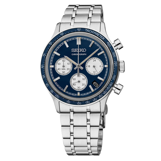 Seiko SSB477 Essentials – blue dial quartz chronograph with white subdials, vintage-style box Hardlex crystal, blue tachymeter bezel, stainless steel bracelet, and 50m water resistance.