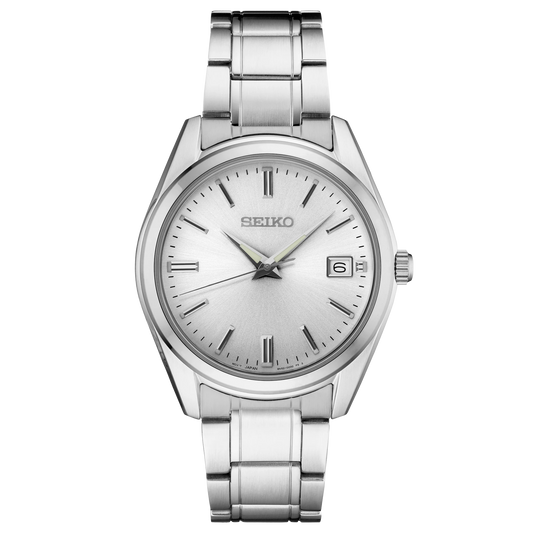 Silver Seiko watch with a white face on a white background
