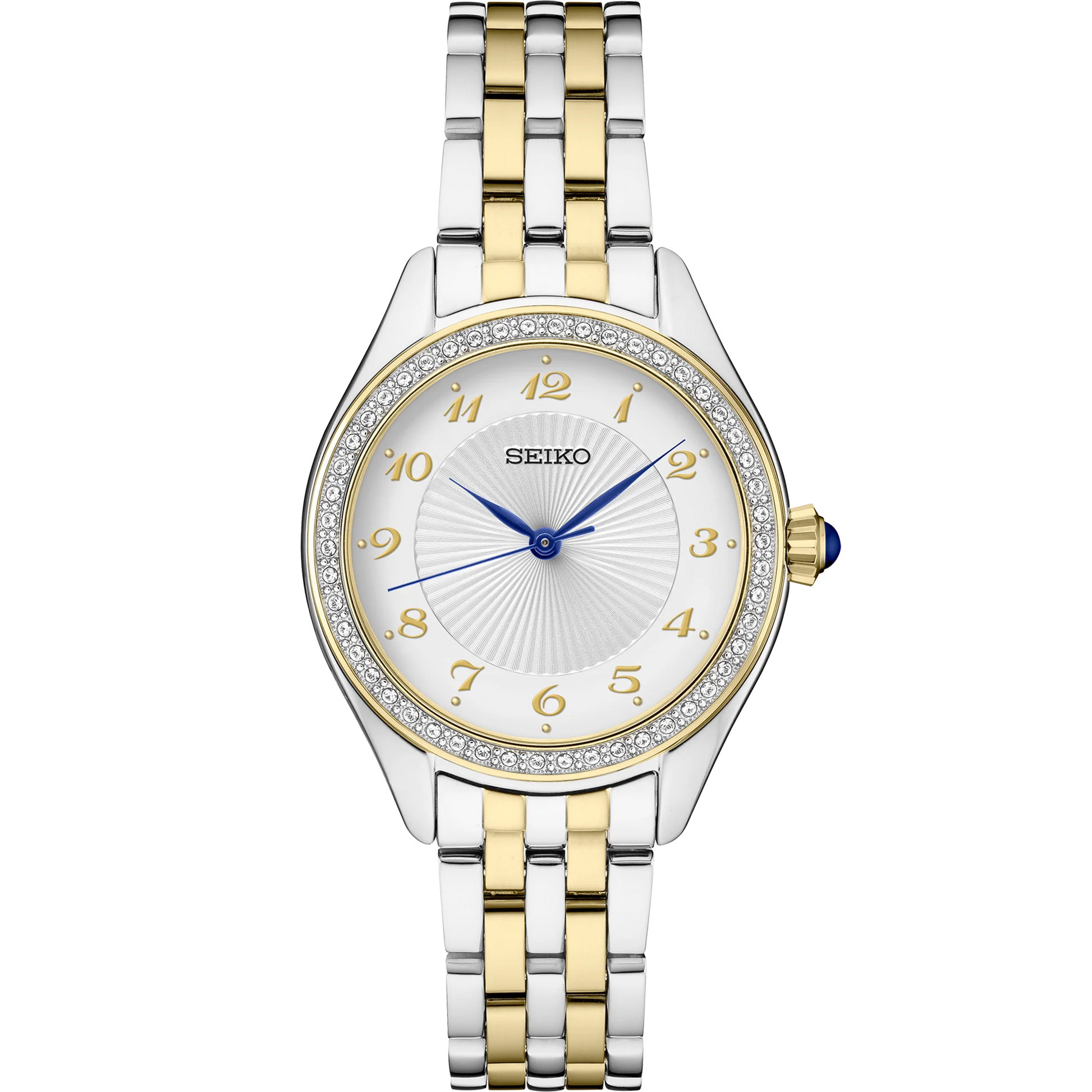 Seiko Essentials SUR392 quartz watch with patterned white dial, crystal accents, gold-tone Arabic numerals, blue hands, blue cabochon crown, two-tone stainless steel case and bracelet, and curved Hardlex crystal.