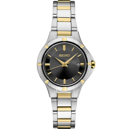 Seiko Essentials Collection SUR414 quartz watch with charcoal sunray dial, gold hands and markers, two-tone stainless steel case and bracelet, date window, and compact elegant design with 100-meter water resistance