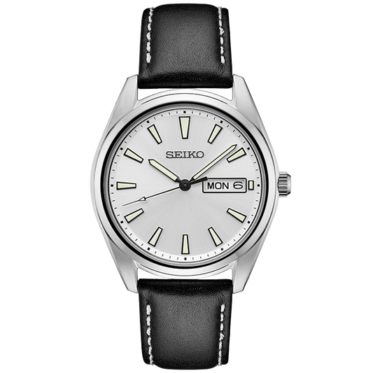 Seiko watch with black leather strap and silver case on a white background