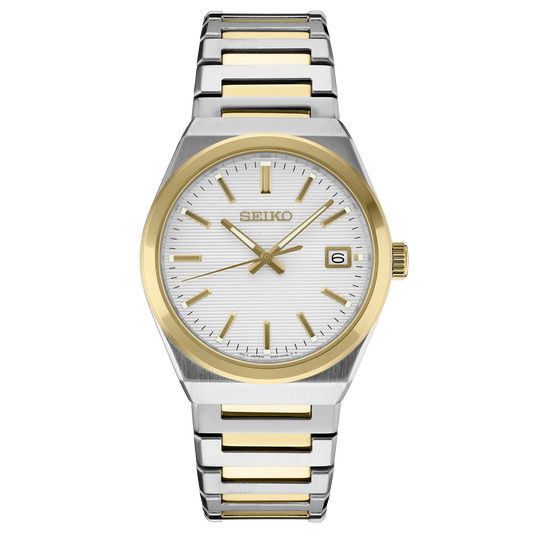 Two-tone silver and gold Seiko watch on a white background