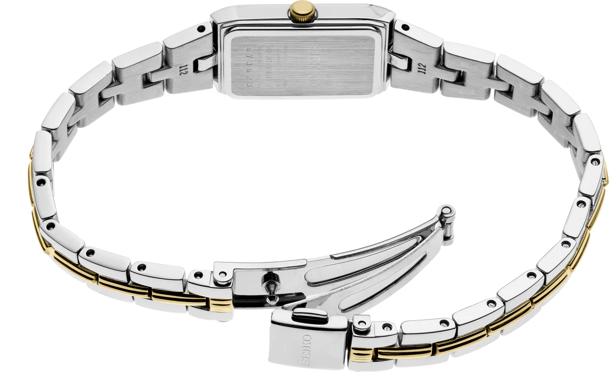 Seiko Essentials SWR044 women’s watch with slim rectangular two-tone stainless steel case and bracelet, white dial with gold-tone hands and markers, Hardlex crystal, quartz Caliber 4N30 movement, 30m water resistance, and ultra-thin 5.68 mm profile.