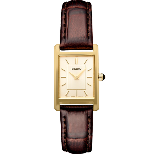 Seiko SWR066 – rectangular gold-tone watch with light champagne sunray dial, cabochon crown, and textured brown leather strap; elegant everyday style from the Essentials Collection.