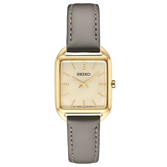 Seiko watch with gold case and gray leather strap on a white background