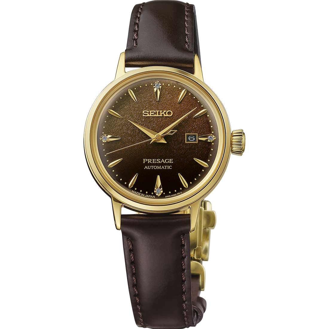 Seiko Presage Cocktail Time SRE020 women’s automatic watch inspired by the Jamaican Coffee cocktail. Features a 30.1 mm stainless steel case with gold finish, brown pressed-pattern dial with four diamond hour markers, and gold-tone hands. Comes with a dark brown leather strap, box-shaped Hardlex crystal, and date display at 3 o’clock. Powered by Caliber 2R05 automatic movement with 21 jewels, 40-hour power reserve, and manual winding. Water resistant to 50 meters.
