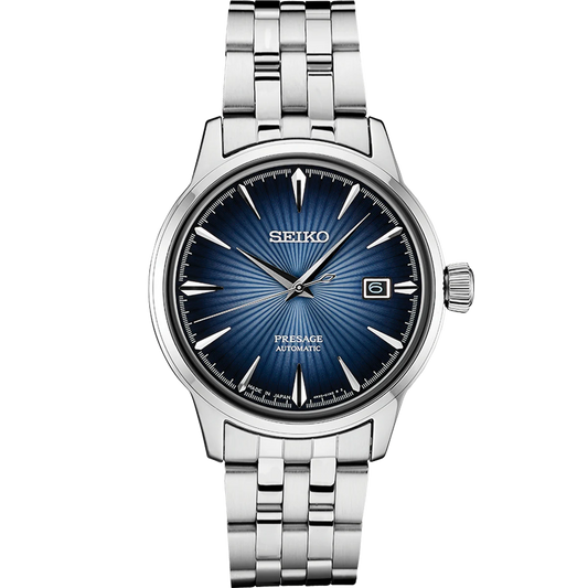 SEIKO Presage Cocktail Time – deep blue dial with pressed pattern and gloss finish, stainless steel case and bracelet, automatic 23-jewel movement, and 50m water resistance.