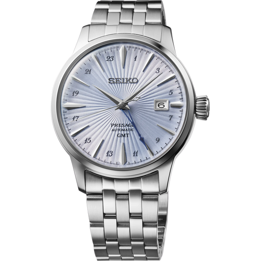 Seiko Presage Cocktail Time GMT SSK037 – light blue dial with pressed pattern, vibrant blue GMT hand, stainless steel case and bracelet, and see-through caseback.
