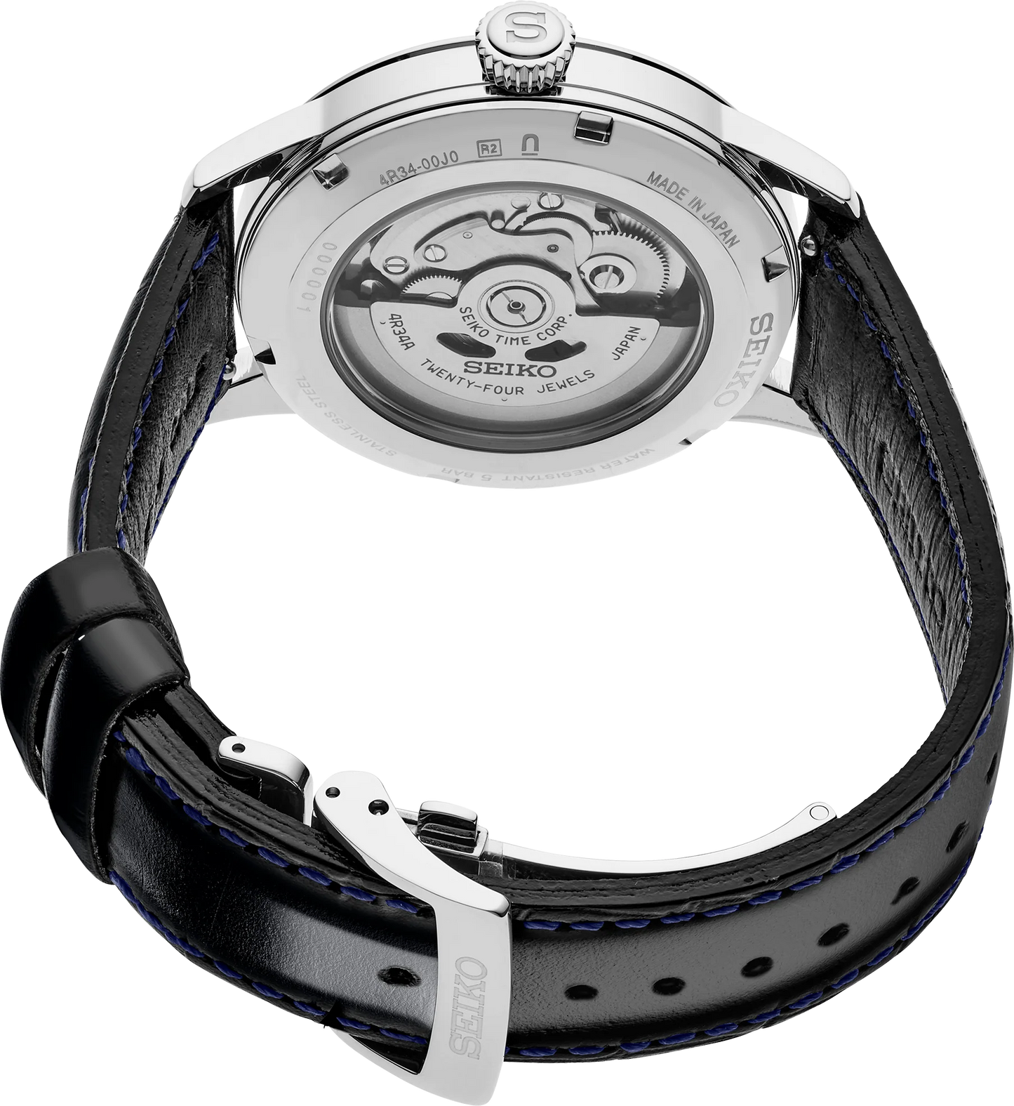 Seiko watch with black leather strap and visible mechanical movement on a white background