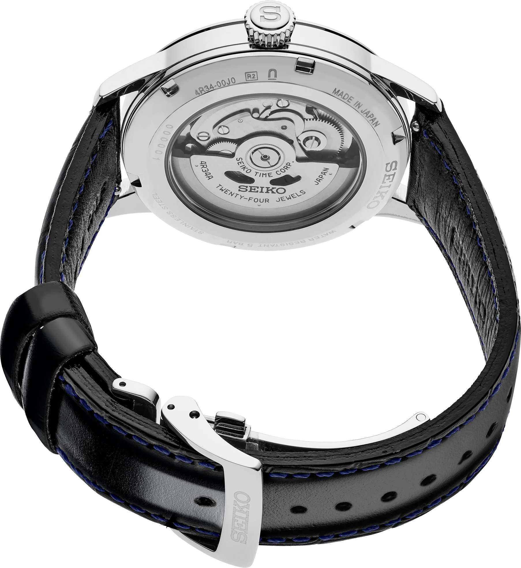 Seiko watch with black leather strap and visible mechanical movement on a white background