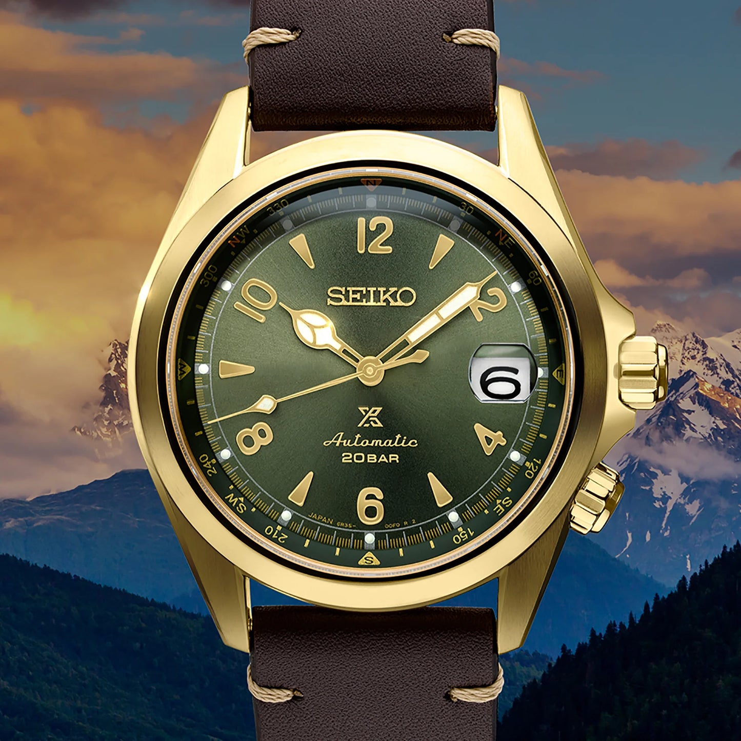 SEIKO PROSPEX SPB210 Alpinist – vintage-inspired green dial with gold accents, inner compass bezel, gold-tone stainless steel case, brown leather strap, automatic movement, and 200m water resistance
