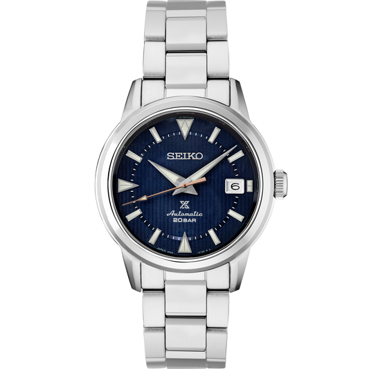 SEIKO Prospex SPB249 Alpinist – blue patterned dial with mountain-shaped markers, stainless steel case and bracelet, curved sapphire crystal, automatic movement, and 200m water resistance.