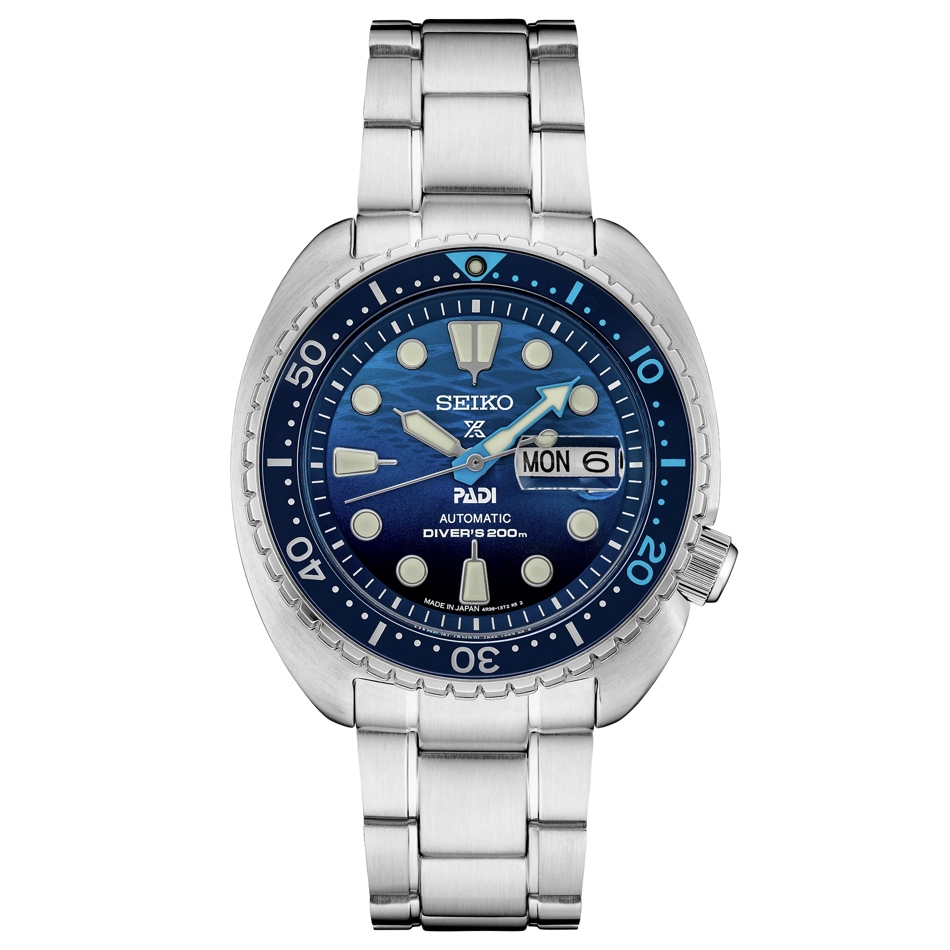 Seiko watch with blue dial and silver metal strap on a white background