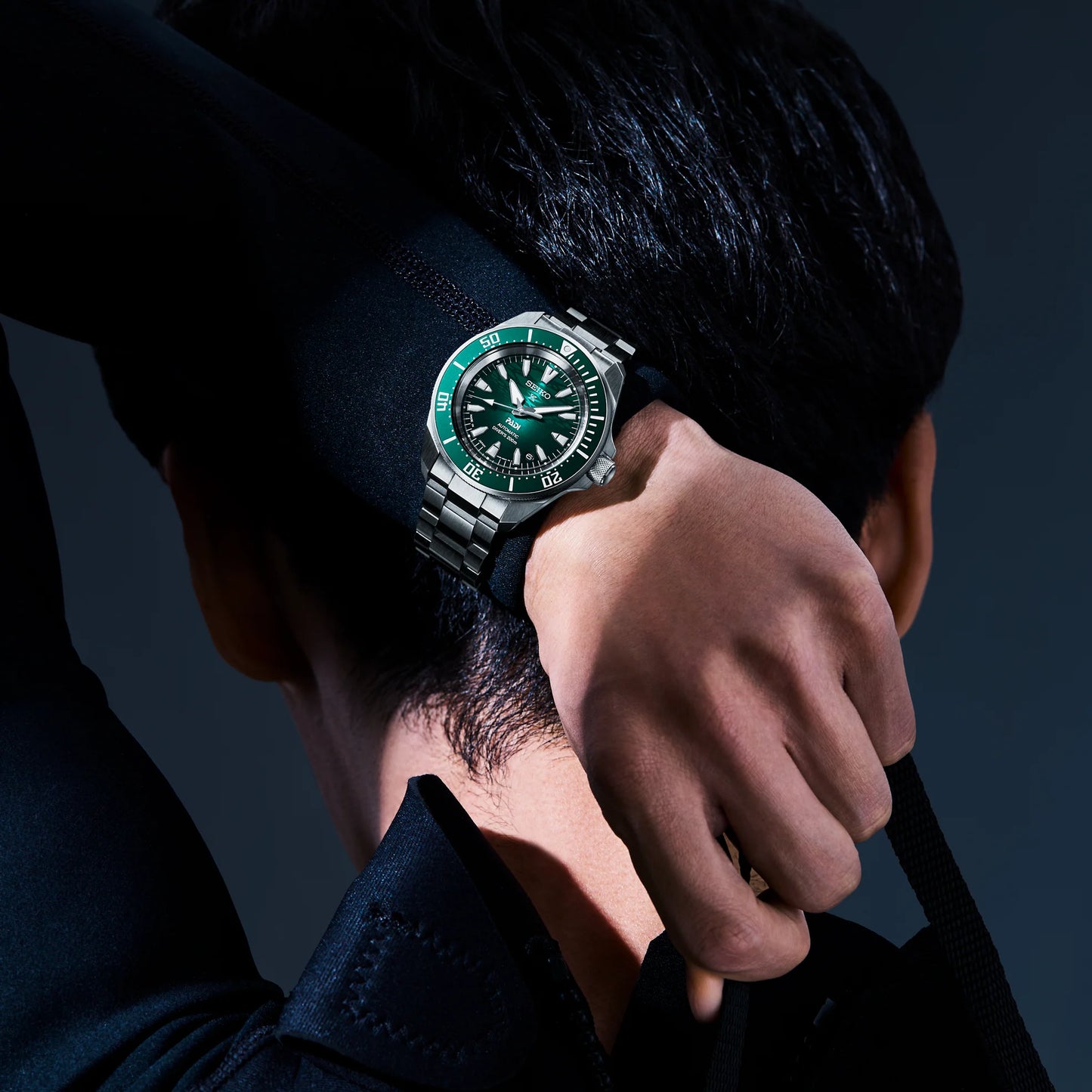 SEIKO Prospex SRPL53 PADI Special Edition – green wave-pattern dial, green rotating bezel, stainless steel bracelet, automatic movement, and ISO-certified 200m water resistance.