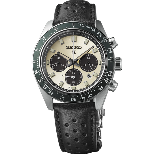 Seiko SSC943 – Prospex Speedtimer Solar Chronograph with ivory sunray dial, black subdials, green tachymeter bezel, and black perforated leather strap; vintage motorsport-inspired solar-powered design.