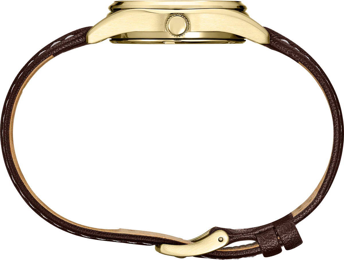 Seiko Essentials SUR456 – compact gold-tone dress watch with champagne sunray dial, brown leather strap, sapphire crystal, day/date display, and 100m water resistance.