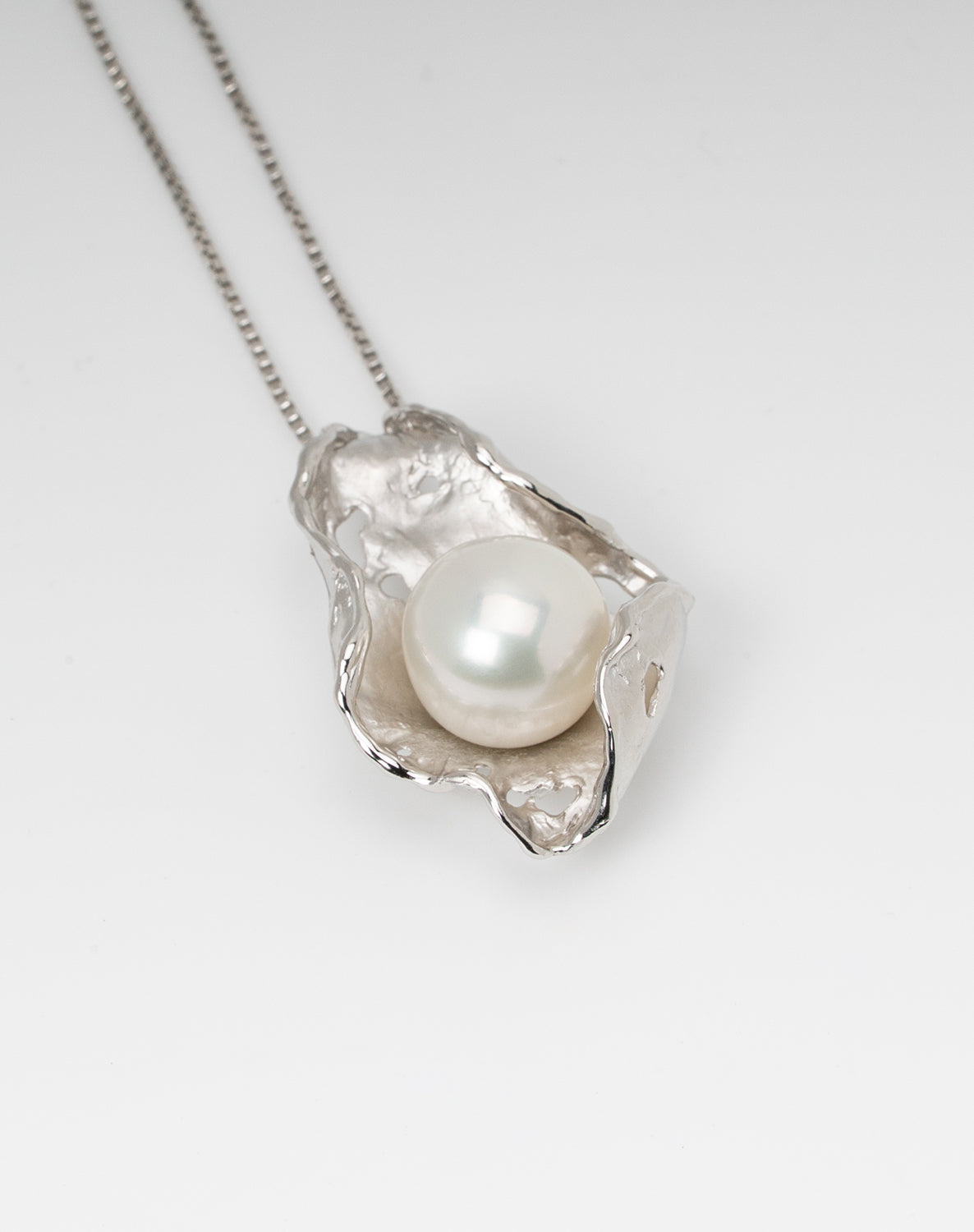 Fine quality 10-11 mm natural white freshwater pearl necklace with sterling silver handcrafted setting from Kofu Japan, button-shaped high-luster pearl, 16-inch chain, exclusive design by Miseki Jewelry