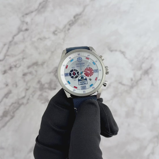 CITIZEN Star Wars R2-D2 CA4219-03W – silver-tone Eco-Drive chronograph watch with blue accents, deep blue CORDURA strap, WR100 water resistance, and R2-D2 inspired design.