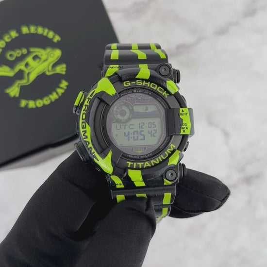 G-SHOCK FROGMAN GW8200TPF-1 professional dive watch with a black and fluorescent green design inspired by a poison dart frog, titanium case, ISO 200m water resistance, and Tough Solar power.
