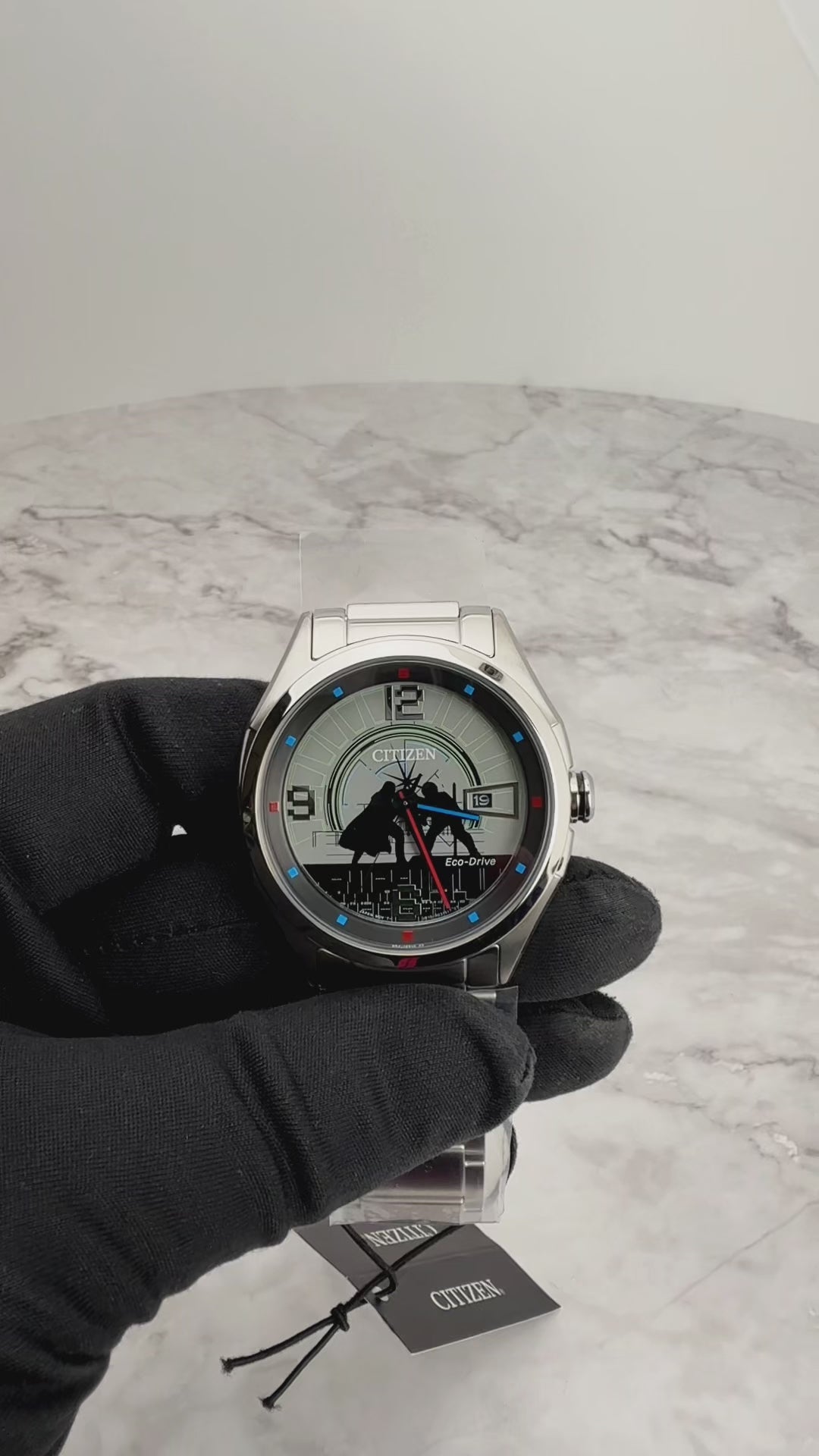 CITIZEN Star Wars Duel AW1140-51W – silver-tone Eco-Drive watch with black duel-themed dial, neon lightsaber hands, engraved case back, and WR100 water resistance.