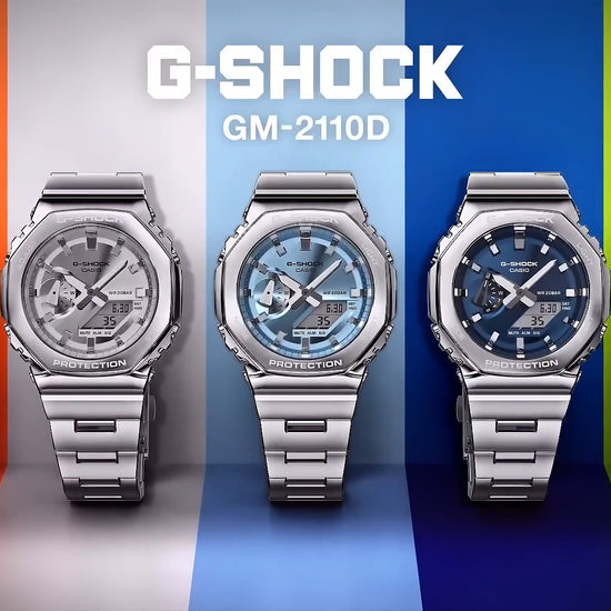 Casio G-STEEL GM2110D-2A, premium stainless-steel G-SHOCK with an octagonal bezel. Features a light blue metallic dial, shock resistance, 200m water resistance, dual LED Super Illuminator, and world time. Stylish and durable.