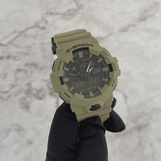 Casio G-SHOCK GA700UC-5A Utility Color Series watch with tan resin case and band, large 3D dial, and analog-digital display.