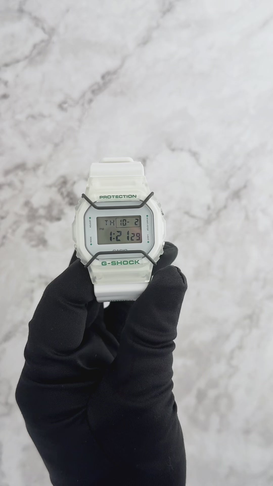 Casio G-SHOCK DW5600HDN257 – Limited Edition HIDDEN NY collaboration with white resin band, transparent green-accented bezel, black bull bars, engraved case back ‘IN THE BLINK OF AN EYE,’ HIDDEN NY logo backlight, special collector’s packaging, 200m water resistance.