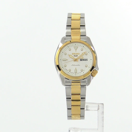 Seiko 5 Sports SRE004 automatic watch with white sunray dial, luminous hands and markers, two-tone stainless steel case and bracelet, and compact vintage-inspired design.