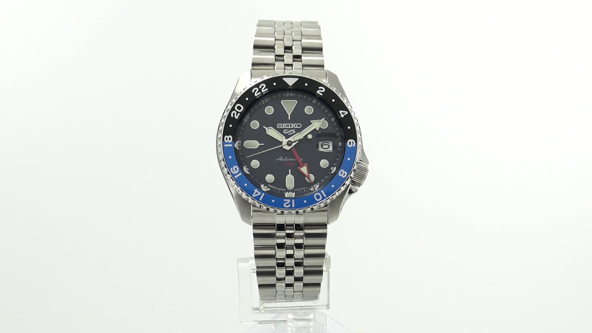Seiko 5 Sports SSK003 automatic GMT watch with a blue dial, blue and black 24-hour GMT bezel, luminous hands and markers, stainless steel case and bracelet, and SKX sports-style design.