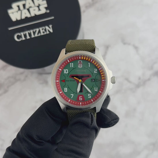 Citizen Boba Fett AW1418-06W Star Wars Eco-Drive watch with green dial, Mandalorian helmet design, 44mm stainless steel case, and olive Cordura nylon strap.