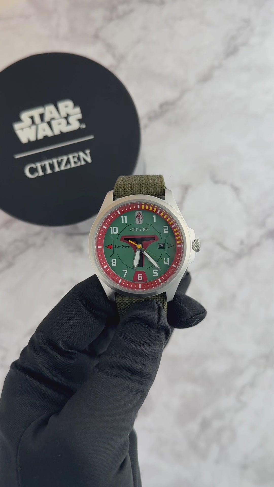Citizen Boba Fett AW1418-06W Star Wars Eco-Drive watch with green dial, Mandalorian helmet design, 44mm stainless steel case, and olive Cordura nylon strap.