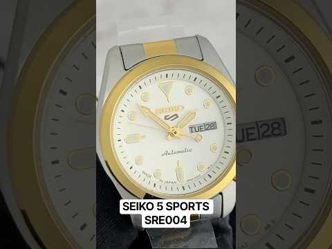 Seiko 5 Sports SRE004 automatic watch with white sunray dial, luminous hands and markers, two-tone stainless steel case and bracelet, and compact vintage-inspired design.