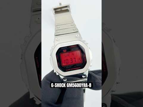 G-SHOCK GM5600YRA-8 square digital watch with stainless steel metal bezel, gray finish, silicone resin band, and 200m water resistance.