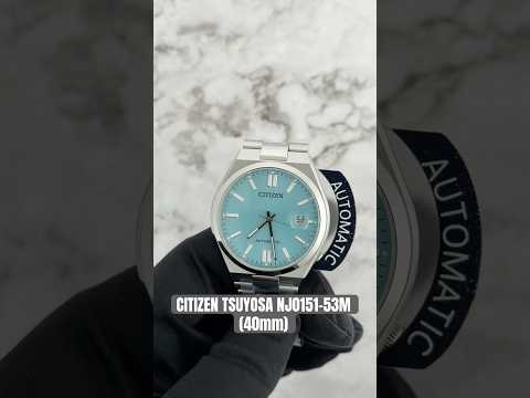 Citizen Tsuyosa Automatic NJ015 series watch with a sunray sky blue dial, integrated stainless steel bracelet, sapphire crystal, and automatic mechanical movement for everyday sporty wear.