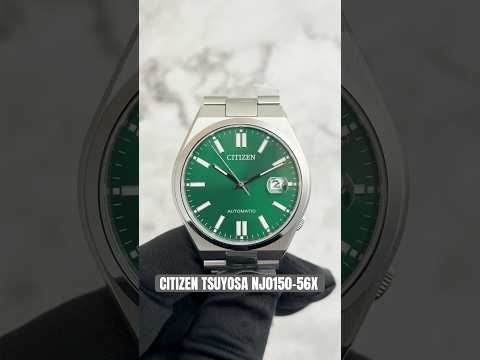 Citizen Tsuyosa NJ015 automatic watch with green sunray dial, integrated stainless steel bracelet, sapphire crystal, and 40mm stainless steel case.