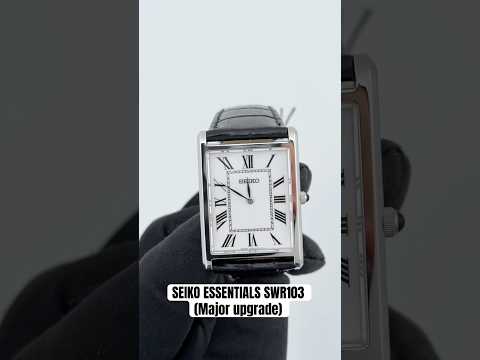 Seiko SWR103 rectangular quartz watch with white Roman numeral dial, slim stainless steel case, sapphire crystal, and black leather strap.
